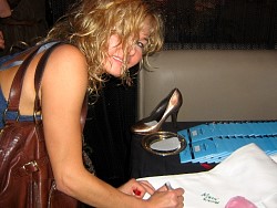 kasia wolejnio signing wizard jeans for charity.jpg